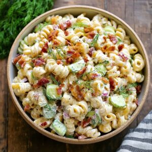 Lighter dill pickle pasta salad with Greek yogurt dressing and less sodium than traditional recipes