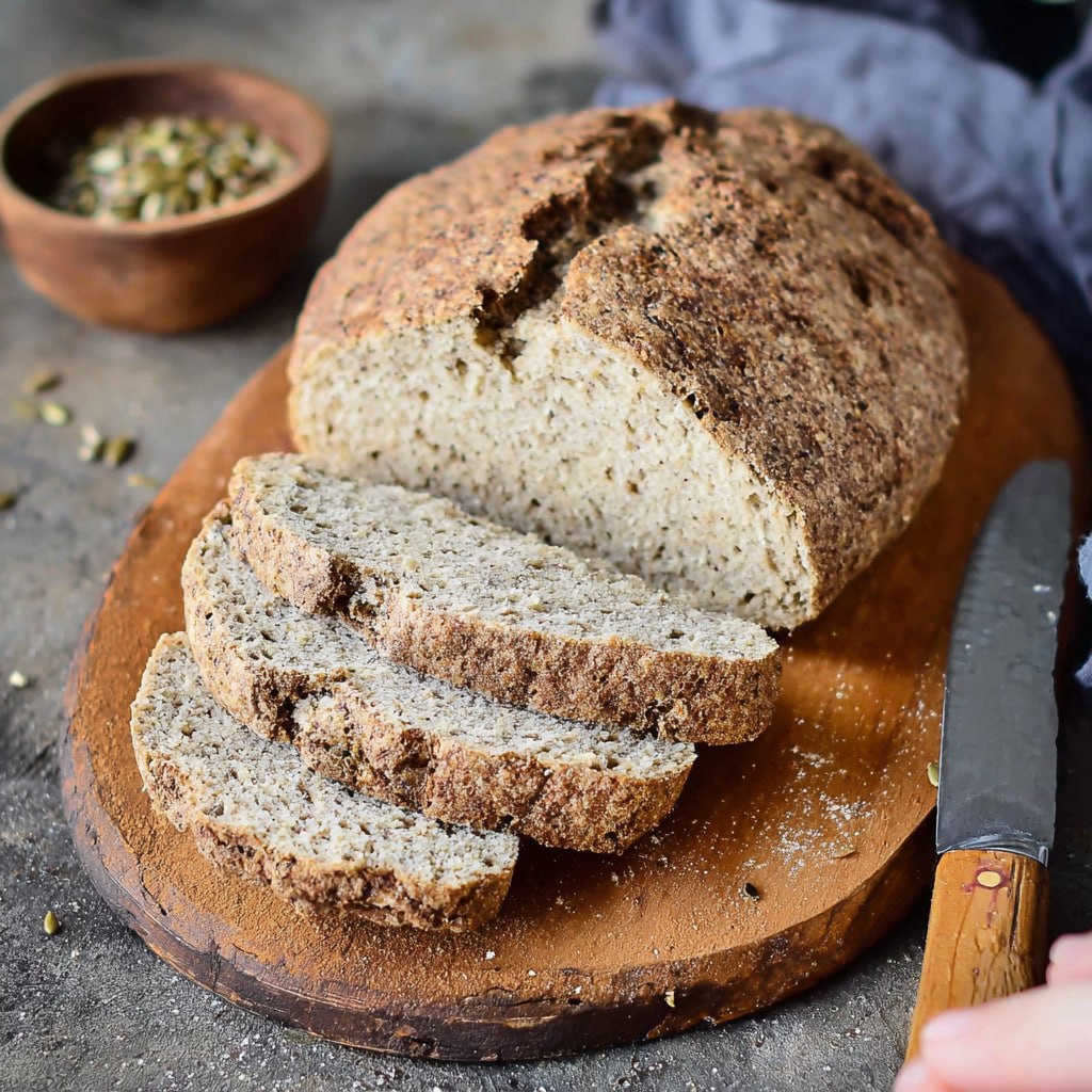 Nutritious homemade vegan bread loaf with golden crust for sandwiches