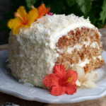 Homemade Hawaiian wedding cake with light cream cheese frosting and tropical pineapple coconut topping
