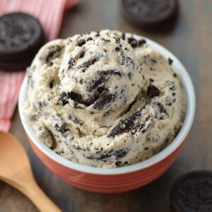 Healthy no-bake Oreo cookie dough in a cup with crushed Oreos