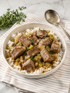 beef tips and gravy over rice