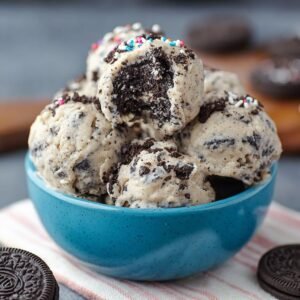 Best edible Oreo cookie dough recipe in a glass jar with Oreo crumbles on top